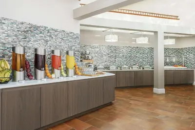 a restaurant with aasteryasteryasteryasteryasteryasteryasteryasteryasteryasteryasteryastery at DoubleTree by Hilton Orlando Airport Hotel in Orlando