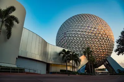 a large building with a giant ball in front of it at Holiday Inn Orlando – Disney Springs® Area by IHG in Orlando