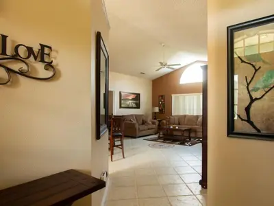 a living room with a couch and a table at 3 Bed 258 in Kissimmee
