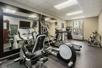 a gym with cardio equipment in a hotel room at Hampton Inn & Suites Orlando-Apopka in Orlando