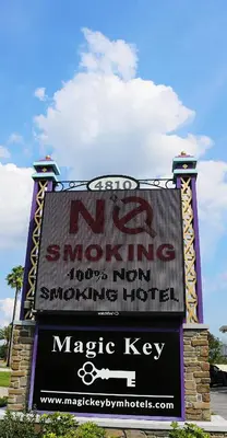 a large sign for a magic key sign at Magic Key - Near Disney in Kissimmee