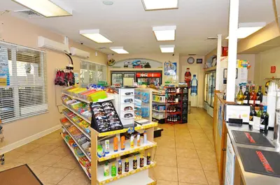 a store aisle of a grocery store with products at Windsor Hills Resort 2 Miles to Disney 6-Bedroom 4-Bathrooms Villa with Private Pool and Spa in Orlando