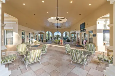 a dining room with chairs and a table at 2582 Windsor Hills in Orlando