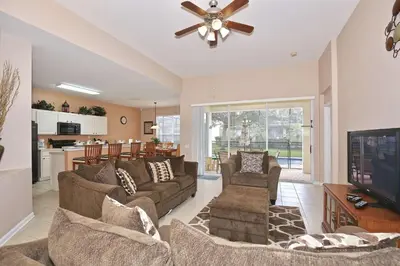 a living room with two couches and a television at 2627 Windsor Hills in Orlando
