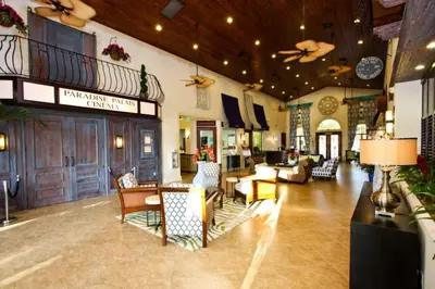 a lobby of a hotel with chairs and tables at 8965 Paradise in Kissimmee