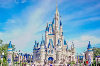 a disney castle on a sunny day at 7669 Windsor Hills in Orlando