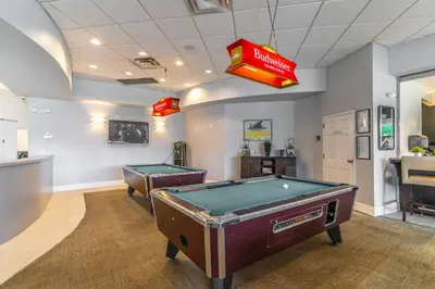 a billiard room with two pool tables in it at 3031 Encantada in Kissimmee