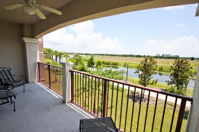 a balcony with a view of a river at 5048 Viz Cay in Orlando