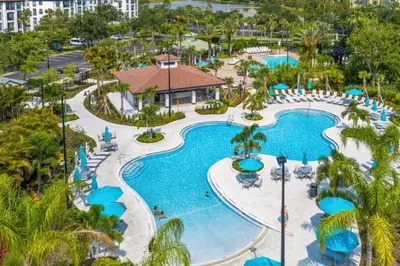 an aerial view of a pool at a resort at 5036 105 Viz Cay in Orlando