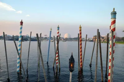 a group of poles in the water with a lantern at 5036 105 Viz Cay in Orlando