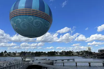 a hot air balloon flying over a body of water at 5036 105 Viz Cay in Orlando