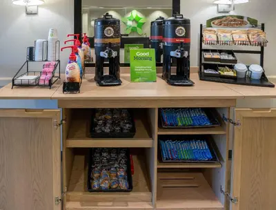 a counter with food and drinks on it at Extended Stay America Suites - Orlando - Lake Buena Vista in Orlando