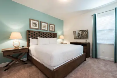 a bedroom with a large bed and a window at Inviting Home With Private Pool Near Disney With Water Park & Resort Access At Encore Resort - 7498Mr in Kissimmee