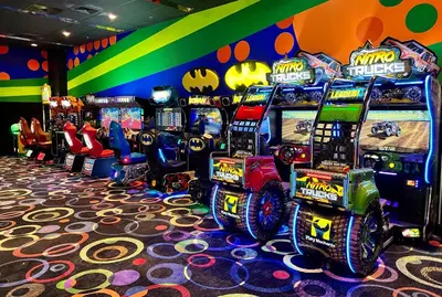 a group of video game machines in a room at Holiday Inn Resort Orlando Suites - Waterpark by IHG in Orlando