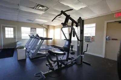 a room with a gym with a treadmill at Orlando RV Resort in Orlando