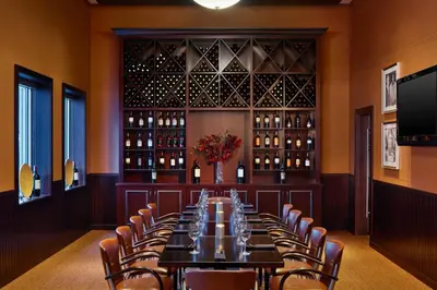 a long table in a room with wine bottles at The Westin Lake Mary, Orlando North in Lake Mary