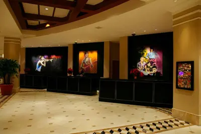a large room with two large screens on the walls at Universal's Hard Rock Hotel® in Orlando