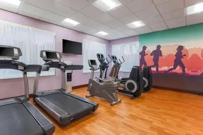 a gym with treadmills and exercise bikes in a room at Hyatt Place Lake Mary/Orlando North in Lake Mary