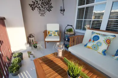 a living room with a couch and a coffee table at Shoreway House #231523 in Orlando