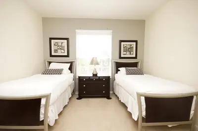 a bedroom with two beds and a window at Shoreway Condo #231524 in Orlando