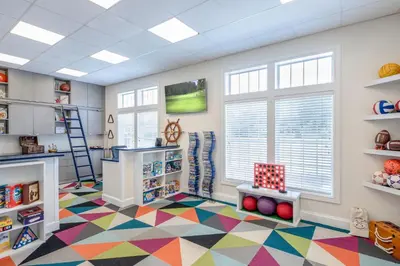 a childs room with a colorful floor at Marriott's Harbour Lake in Orlando