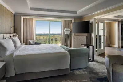 a hotel room with a bed and a large window at JW Marriott Orlando Grande Lakes in Orlando