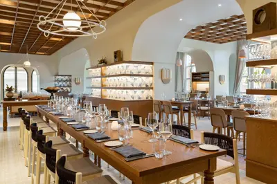 a large dining room with tables and chairs at JW Marriott Orlando Grande Lakes in Orlando