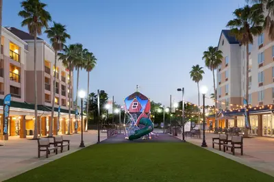 a playground in the middle of a street with palm trees at Courtyard by Marriott Orlando Lake Buena Vista in the Marriott Village in Orlando