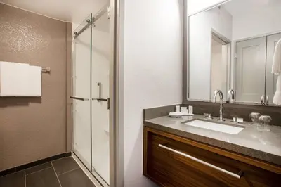 a bathroom with a sink and a shower at Courtyard Orlando Altamonte Springs Maitland in Orlando