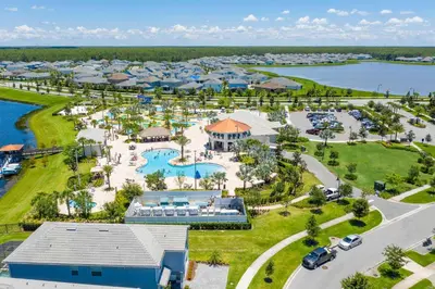 an aerial view of a resort with a pool at Five Bedrooms Home with Pool 4851 in Kissimmee
