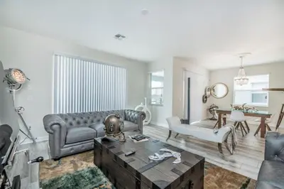 a living room with a couch and a table at King Castle Circle Villa #237082 in Kissimmee