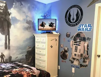 a bedroom with a star wars mural on the wall at Windsor Hills Resort - Enchanted Crystal Castle in Orlando