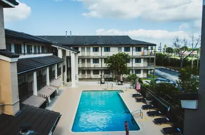 an overhead view of a hotel with a swimming pool at Quality Inn & Suites By the Parks in Orlando