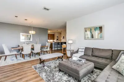 a living room with a couch and a table at Casa Maria Condo in Orlando