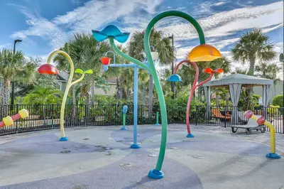 a playground with a bunch of different colored swings at Family Vacation Villa, Water Park, Endless Amenities in Kissimmee