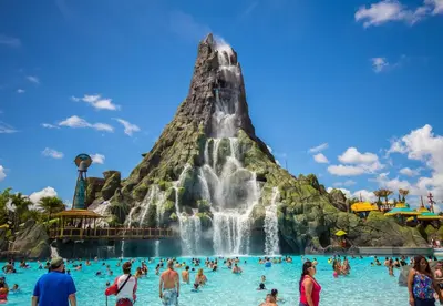 a group of people in the water at a water park at Family Vacation Villa, Water Park, Endless Amenities in Kissimmee