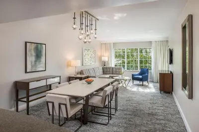 a living room with a table and a couch at Marriott's Lakeshore Reserve in Orlando