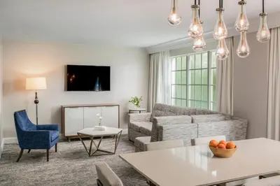 a living room with a couch and a table at Marriott's Lakeshore Reserve in Orlando