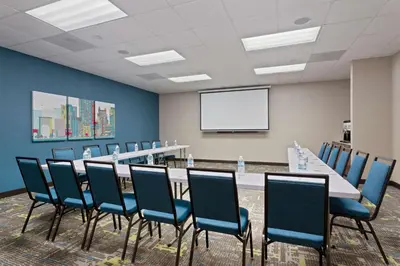 a conference room with a long table and chairs at Hampton Inn & Suites Orlando International Drive North in Orlando
