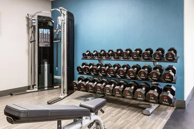 a gym with a rack filled with lots of balls at Hampton Inn & Suites Orlando International Drive North in Orlando