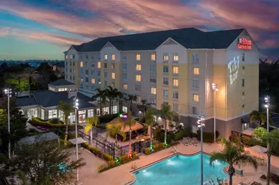 an aerial view of a hotel with a pool at Hilton Garden Inn Orlando International Drive North in Orlando