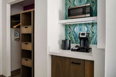 a kitchen with a coffee maker and a microwave at Hilton Garden Inn Lake Mary in Lake Mary