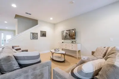 a living room with two couches and a table at Welcoming Home With Private Pool Near Disney With Waterpark & Resort Access At Encore Resort - 761La in Kissimmee