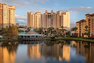 a view of a city with tall buildings and a lake at Wyndham Grand Orlando Resort Bonnet Creek in Orlando