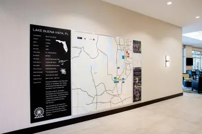 a large map on a wall in a lobby at TownePlace Suites by Marriott Orlando Theme Parks Lake Buena Vista in Orlando