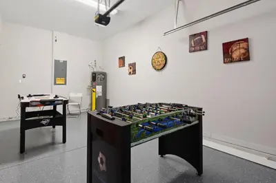 a room with a table with bottles on it at Family Friendly Four Bedrooms 5147A in Kissimmee
