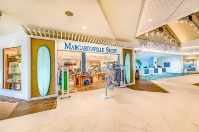 a store with surfboards on the wall at Margaritaville Resort Orlando with H2O Waterpark in Kissimmee