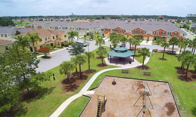 an aerial view of a apartment complex with a park at Four Bedroom with GameRoom 5150A in Kissimmee