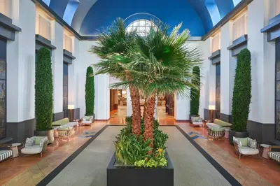 a palm tree in the lobby of a hotel at Walt Disney World Dolphin in Orlando