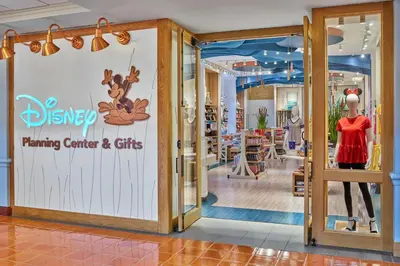 a store window with a mannequin in a store at Walt Disney World Dolphin in Orlando